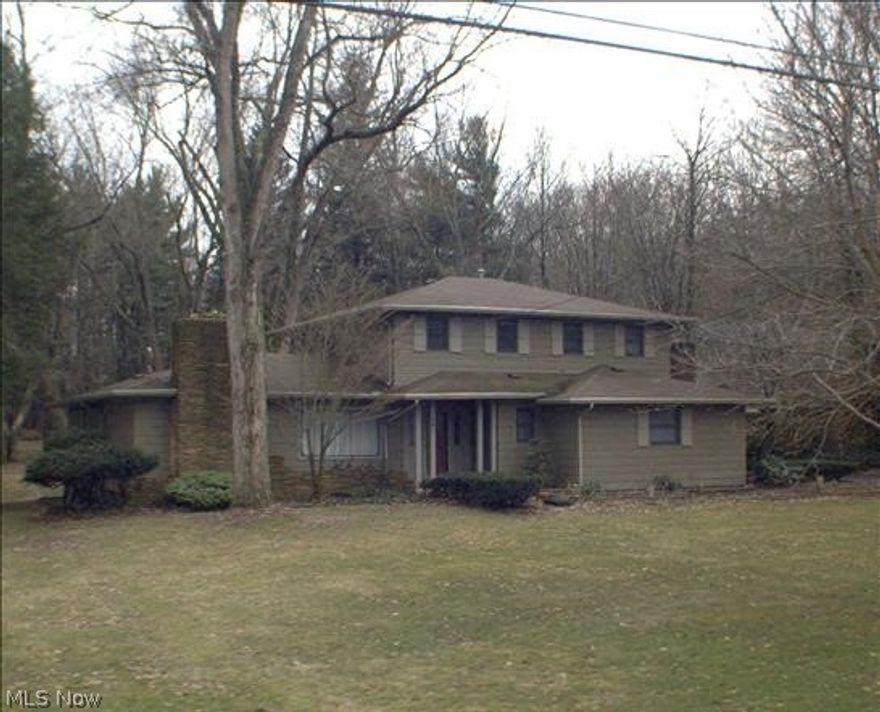 Welcome! Country Setting! Tried & true 4 BR 3 BA Colonial. Entertainment formal L.R. (24x13) with hardwood floors, WB FP. Opens to formal D.R. - HW Fls. Both have access to enclosed Sun porch (16x14). Eat-in Kitchen (18x16) features oversized windows - scenic views of Deck & yard. 1st FL MBR / Guest suite! 2nd Fl MBR suite includes built-ins, french doors to private deck! 19x18 family room HDW Fls - Built-ins. 2 + car garage - extensive workshop/home business/craft room option. Worry Free Home Warranty!