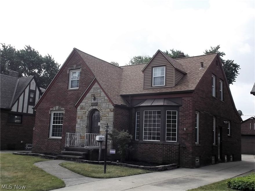 * BRICK Beauty * Spacious Living Room with Bow Window & Vestibule Entrance * Formal Dining Room with Oak Crown Molding and China Cabinets * Large Oak Kitchen with Dishwasher * Four Bedrooms Plus Bonus Room * Full Basement * Newer Furnace, 80 Gallon Water Heater * Large Deck off Dining Room * Extra Deep 32" Deep Block Garage * Large Fenced Yard * 1 Year Home Warranty *