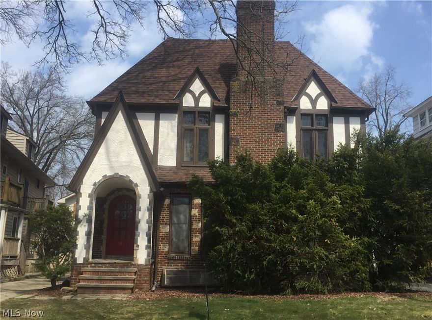 Handsome Tudor 3-family looks like a single family home. Large formal rooms with  hardwood floors, unique partially finished Lower Level with a 1/2 bath.1st and 2nd floor back bedrooms have 3 season rooms connected.Huge 3rd floor unit includes 2 bedrooms and two cedar closets plus storage +3 car garage. Great location, close to Lee Rd restaurants and convenient to Bus line for Cultural hub & hospitals. This is a Great opportunity for owner occupied!
 new roof 2016; new boiler 2015
H2O tanks last 3-4 years