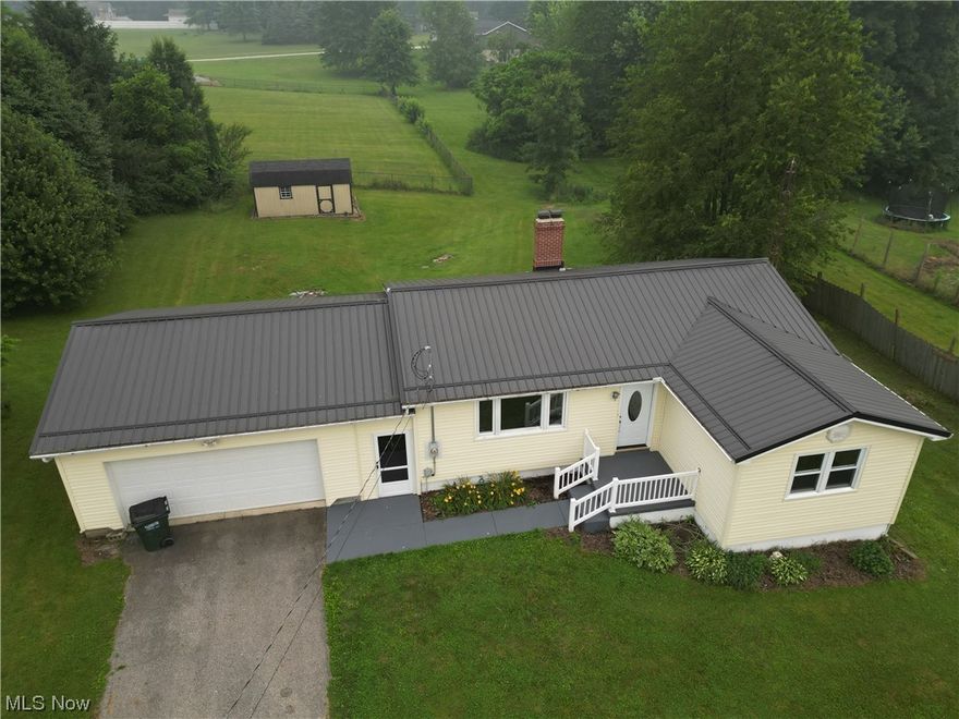 "Looking for an affordable, turn-key home just outside city limits, yet within minutes of the bustling downtown? Look no further! Presenting a charming, clean 3-bedroom ranch home that's move-in ready. This welcoming residence features a solid Hickory kitchen that's sure to delight home chefs, alongside a dedicated dining area and a cozy living room for comfortable gatherings. Nestled on a full block walk-out basement, the home also offers an additional laundry hookup, demonstrating the thoughtfulness that went into its design. Energy efficiency is a priority with a newly-installed heat pump, providing year-round comfort while keeping utility bills in check. The home's exterior is as equally inviting and low-maintenance as its interior. A paved driveway leads up to the home, adorned with durable vinyl siding and a metal roof equipped with a gutter guard to withstand the elements. The property also boasts a spacious 12'x20' shed, offering ample storage or potential workshop space. Agent