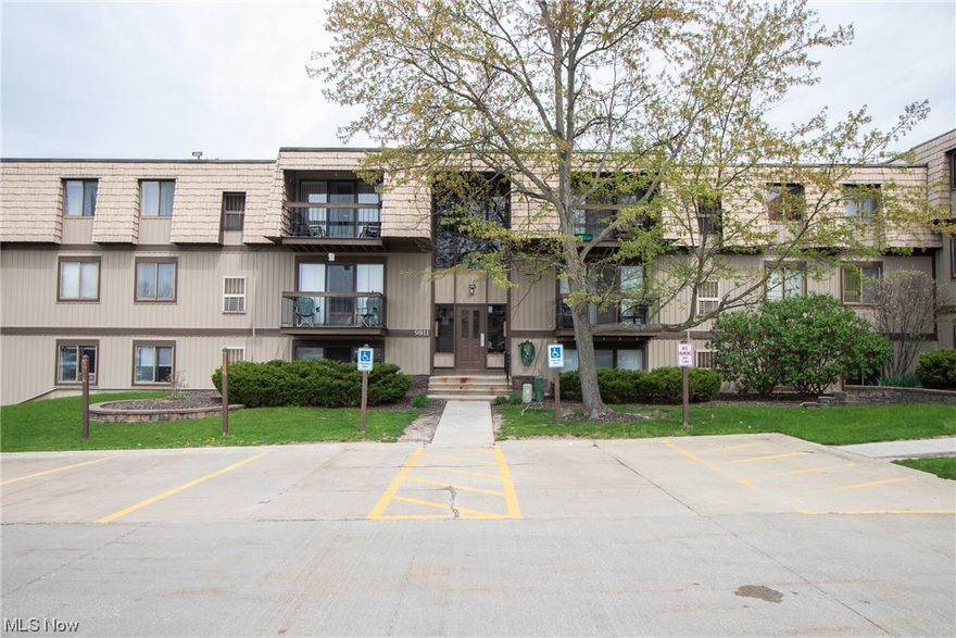 Welcome home to this spacious condo that features 1,152 sq ft of living space.  It features 2 bedrooms and 2 full baths.  Once inside you step into the inviting, bright living room that is also open to the dining area.  Access to the deck is through sliding glass doors which provide a ton of natural light to both of these rooms.  The eat-in kitchen is off the dining area and features lovely cabinets, a tile backsplash, and plenty of storage space. All appliances stay! Down the hall, you will find the master bedroom with a large closet and ensuite full bath.  There is also another bedroom which has ample closet space and a second full bath.  Laundry is located in the unit and the washer & dryer are included.  The deck provides the perfect spot for relaxing on a warm summer night.  This condo comes with and is assigned 1 car garage. The amenities include a pool, a tennis court, and two basketball half-courts. Enjoy views of the lovely pond and landscaping. Desirable location close to hig