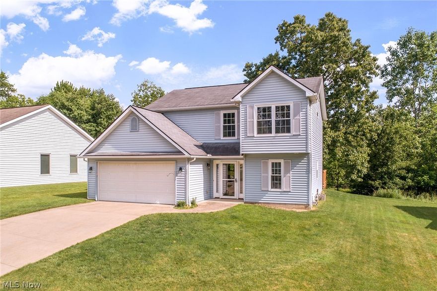 Located on a quiet cul-du-sac, this 3BD/2.5BA home is sure to please with its welcoming 2-story foyer, first floor guest bath, and open floor plan with maintenance-free vinyl flooring on the main level. The kitchen boasts plentiful oak cabinets, and overlooks the dining room that opens to the large, private deck (2016) that's perfect for entertaining or for a quiet day enjoying the private and treed backyard! Pass through the dining room to the cozy great room with gas fireplace and light and bright windows. The rear center hall staircase leads upstairs to reveal 2 ample bedrooms and a full bath. The large master bedroom has vaulted ceilings and an en-suite bath with a recently-installed large tub and shower combo. A 2nd floor laundry adds convenience and ease of living. Updates include a newer hot water tank and expansion tank (2020), windows (2015), as well as newer main entry door and entry door to the 2-car garage (2016). If you are looking for convenient city living near shopping,