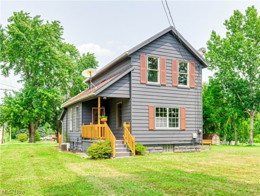 A beautifully updated colonial in Tallmadge on a corner lot. Enter your new home to your spacious dining room that is freshly painted in neutral colors throughout. The dining room is off the living room ideal for large gatherings especially with the holidays coming up. The amount of windows in your new home makes you feel like you are outdoors. Immaculately remodeled kitchen with soft gray cupboards to match the tile backsplash and flooring. Built in shelves just waiting on your cookbooks. Space for a kitchen table so you can keep the conversations flowing in every room. The bedroom on the 1st floor has great closet space. A full bath completely updated on the 1st floor. Upstairs is the master bedroom with high ceilings and 2 closets and a 3rd bedroom with great space. Outdoors is a large deck space just waiting for your grill and patio furniture. What a great space to watch the leaves change this fall.  A 2 car detached garage with enough room for your vehicles and seasonal toys. It o