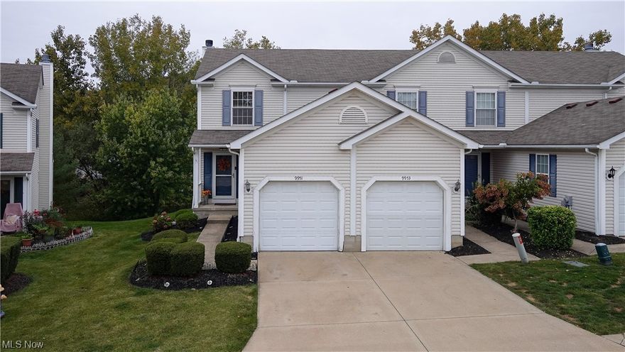 Beautifully updated townhouse. W/ 2 large bedrooms, finished basement, new flooring throughout, updated kitchen with newer cabinets, granite countertops, stainless steel appliances, new backsplash. Also has gas fireplace, backyard deck with wooded views, attached garage with nature stone flooring.