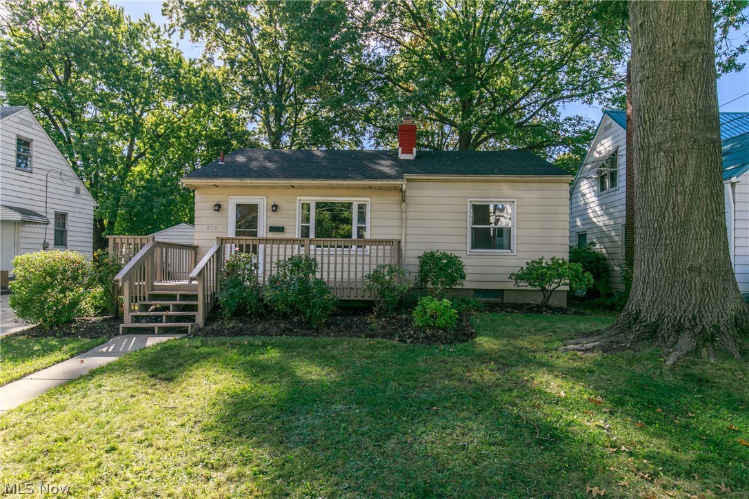 Welcome to this charming ranch home located in Cuyahoga Falls! The large front porch will be the perfect place to sit this fall season to watch the leaves change. The fireplace in the living room sparkles from the natural light shining through the large windows with attractive hardwood floors. An adorable kitchen with stainless steel appliances and a cozy eating area. Two nicely sized bedrooms and two updated bathrooms. Finished waterproof basement that would make the perfect rec room! A big back porch overlooking your stunning backyard that will be ideal for those summer cookouts. One car garage with an additional space in the back for storage, workshop or game room! New roof, A/C, and water tank. Newer furnace. Fresh paint throughout.