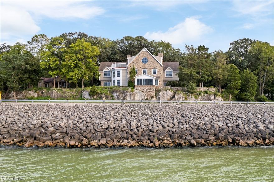 Waterfront Lake Erie Home On 2 Acres – Stunning Views - Ideal Place To Call Home Or Family Retreat - ABSOLUTE AUCTION, All sells to the highest bidder on location. ONLINE BIDDING BEGINS SUNDAY, SEPTEMBER 24, 2023 – 12:00 PM and AUCTION LIVE ON-SITE BIDDING WILL BEGIN WEDNESDAY – SEPTEMBER 27, 2023 - 12:30 PM. Waterfront Lake Erie home overlooking Rock Ledge with stunning views. Known as the “Winding Stairway Cottage,” the home has been in the same family for over 118 years with a major rebuild and addition in 1999. This property has tons of lake frontage, mature landscaping and trees for privacy, beautiful stone walking paths, a waterfall, and much more. The main floor features an oversized foyer that leads to an open kitchen with tons of cabinet space, an island, and a breakfast nook plus a formal dining room, half bathroom, and laundry room. Two-story spacious living room with floor-to-ceiling windows and a gorgeous stone fireplace. Cozy sunroom with the best views of the lake in tow