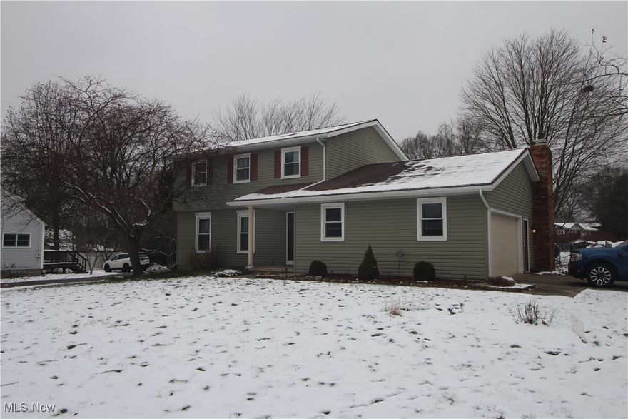 Welcome home to this beautifully maintained Tallmadge colonial, set on just over a half-acre with plenty of space inside and out. This 3-bedroom, 2.5-bath home blends comfort, function, and charm in a location close to everything - schools, the Rec Center, Maca Pool, and local shopping yet tucked in a peaceful neighborhood with driveway access from Milton Dr.

Step inside to a welcoming main level that offers both room to gather and room to unwind. The large living room flows nicely into a cozy family room with a wood-burning (or gas) fireplace, while the central eat-in kitchen connects easily to a formal dining room, office/flex space, and half bath. The bright 3-season sunroom opens to a backyard designed for enjoyment, complete with a deck for grilling or relaxing, a fenced area with pet turf, and a spacious storage shed with loft.

Upstairs, you'll find a comfortable primary suite with private bath, two additional bedrooms, and another full bath. The lower level adds even more flexibility with ample room for storage, recreation, or hobbies, whatever fits your lifestyle best.

Thoughtfully cared for over the years, the home features numerous updates, including new siding, gutters, and entry doors (2018), luxury vinyl plank flooring (2016), roof (2014), and vinyl replacement windows (2007), plus other thoughtful improvements throughout (per seller).

If you've been waiting for a Tallmadge home that feels warm, welcoming, and move-in ready- this is it.