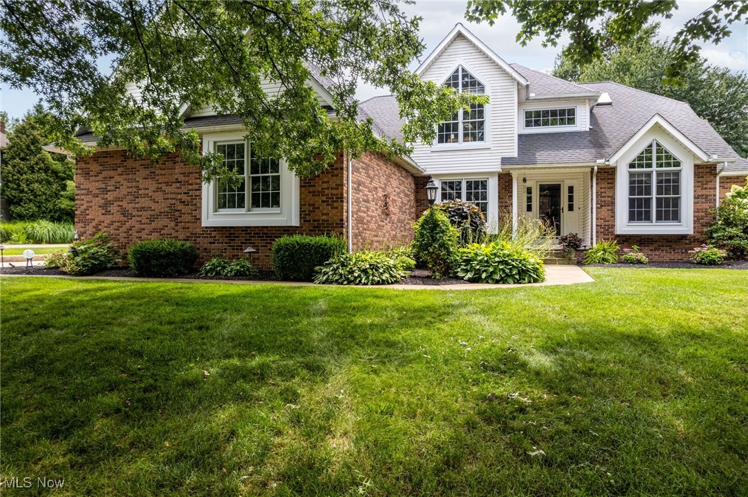 Gracious Living on the Green at Chenoweth Golf Course. Welcome to a home that blends timeless design w/thoughtful updates, nestled along the 14th tee of Chenoweth Golf Course. W/4 bedrooms, 3.5 baths, and a floor plan designed for both gathering and retreat, this property is a true sanctuary. Step inside to the sunken great room, where a soaring ceiling, dramatic wall of windows, and a modernized gas fireplace create an inviting heart of the home. Formal dining room exudes classic elegance w/a tray ceiling, crown molding, and chair rail detailing—ideal for hosting cherished holidays and special occasions. Just off the main living area, a comfortable sitting room/den/awaits, highlighted by a vaulted ceiling and a striking angled window that welcomes morning light. The eat-in kitchen is a chef’s delight—featuring Quartz countertops, double oven range, a walk-in pantry, breakfast bar, abundant cabinetry, built-in desk space, and a bayed dinette perfect for enjoying casual meals w/a view. The first-floor primary suite is a true retreat, w/a bayed window, bath offering double sinks, a makeup vanity, walk-in tile and glass shower, a walk-in closet plus a second closet for ample storage. Upstairs, a lofted hallway w/Juliet balcony overlooks the great room, leading to three spacious bedrooms and two full baths—providing comfort and privacy for family or guests. The finished lower level expands your living space w/a family room, exercise room, workshop, and abundant storage. Step outside and be captivated—the outdoor living area is extraordinary. Enjoy gatherings around the stone counter and gas grill under the pergola, cozy up by the fire pit, sip drinks at the stone bar, tend to your raised vegetable garden, or unwind beside the peaceful waterfall, day or night. So many thoughtful updates throughout—please call for the full list! A one-year America’s Preferred Home Warranty is included. Don’t miss your chance to own this remarkable home—call your favorite REALTOR® today!