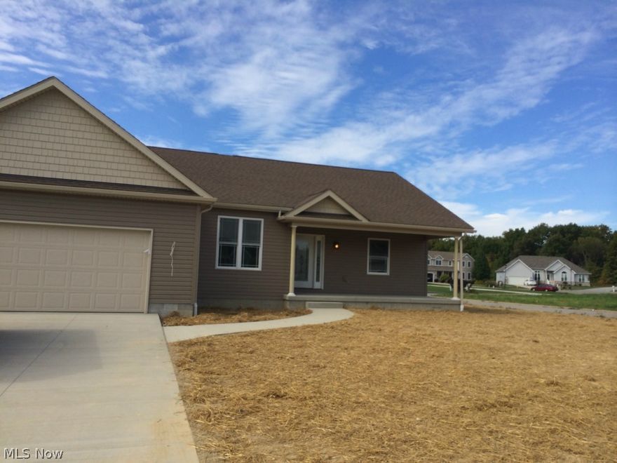 Quality built ranch with open floor plan.  The master suite has walk in closet and tile shower with double sinks. Main living area has hard wood floors all through the kitchen dining room and great room.  The great room has 10' ceilings and a stone fireplace.