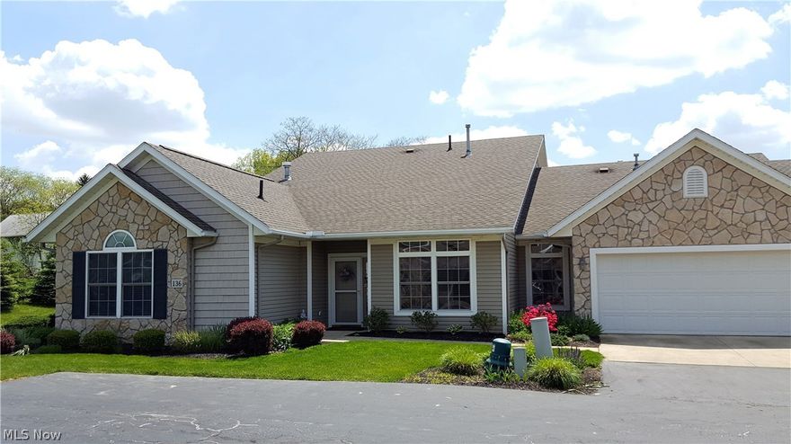 Wonderful condo in Wetherington has been tastefully updated in quality finishes and inviting colors. This 2 bedroom, 2 bath Legacy style condo is a desired floor plan and is spacious with nearly 1500 sq. ft. of one floor living.  You'll love the openness of the great room which boasts a corner gas fireplace and inviting laminate flooring. The bright sun room is relaxing and features wooded views.  Preparing meals will be a joy in your beautiful kitchen featuring granite counter tops, tile back splash and ceramic tile flooring. The tile flooring continues into the laundry room and there is an additional storage room behind the garage. This home has plenty of storage!  The bedrooms are big and bright  featuring large windows and each bathroom has been updated  with granite and ceramic tile floors. The crown molding and custom window blinds add special flair to this home.  A great home in a great location!