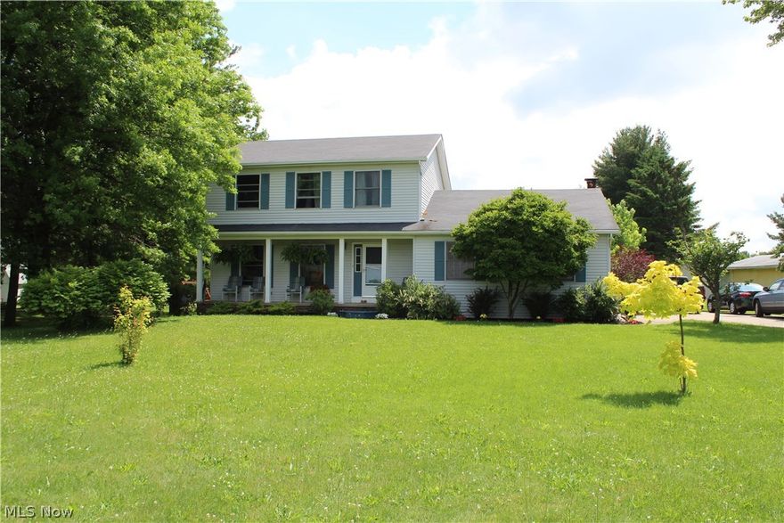 Updated 3 bedroom, 2.5 bath colonial on beautiful country acre only minutes from Wadsworth/Medina. Hickory wood floors (2014) flow thru out the main level, which features an airy formal living room, open kitchen with generous island and newer stainless steel appliances (2014), updated half bath and family room with 9' ceiling and dramatic wood burning fireplace. 12x25 deck is great for relaxing or entertaining. Freshly carpeted bonus room in lower level could be anything you want it to be. This custom built home boasts an attic fan, 135' deep well, gardening space - all located in top-rated Wadsworth School District!