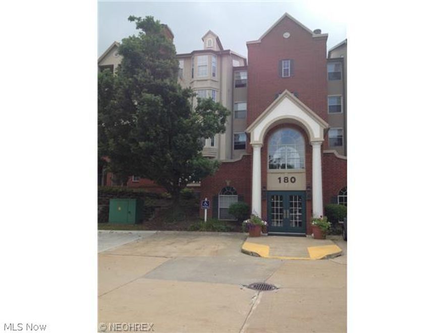 Move right into this gorgeous, bright and completely updated corner unit in one of the nicest buildings in Woodhawk. The entry and dining room have real bamboo floors. The kitchen boasts loads of granite counter space, a breakfast bar, cabinetry, real ceramic tile and new appliances. The large master has double doors leading into a huge bathroom, with tile floor and shower a spacious walk in closet, linen closet and private toilet room make this bathroom incredible. This unit has a  nice outdoor patio, a parking space in the heated garage and two storage lockers. Woodhawk offers 2 beautiful pools, health club, walking trails and a 24 hour manned security gate. Take advantage of this very modern move in ready condo.