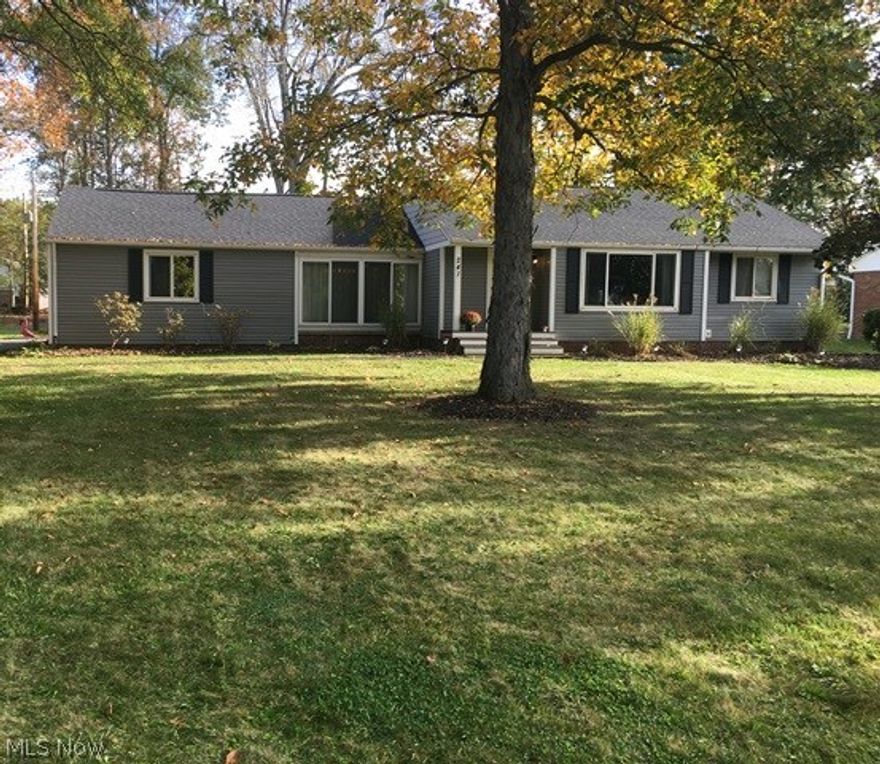 Affordable and beautiful ranch in Hudson.  Totally updated with wood floors, kitchen, bathroom, etc.  Totally open floor plan.  The beautiful stone fireplace in the living room has gas logs controlled by remote.  The siding, roof, windows, furnace, and hot water tank are all newer in the past several years.  The views of the backyard are beautiful.  
All appliances stay.
Move right in and enjoy this home with nothing to do.