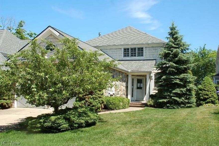 Stunning detached cluster offers remarkable Metropark views! Inside, you will find a lovely foyer, large great room with custom built ins flanking the fireplace, vaulted ceilings, large formal dining with crown molding, den with coffered ceiling, eat in kitchen, first floor laundry, new ss appliances, first floor master suite with jetted tub, an awesome heated sun room with amazing views, 2 large bedrooms up with a full bath each, a spacious loft, finished basement with partial second kitchen and plenty of storage throughout! Beautiful rare find in Rocky River!