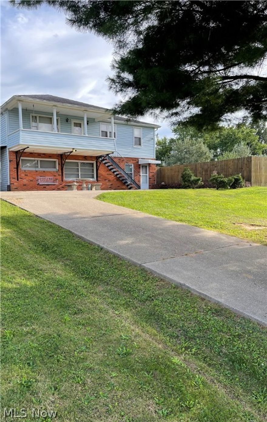 Back on the market at no fault of its own! This fantastic home might just have been waiting for you! This well maintained home offers updates all throughout, inside & out! Sitting on a HUGE double lot outside city limits, this home has a large front, rear and side yard, and is completely move in ready. The upper and lower decks make it great for entertaining with the privacy of a fully fenced in back yard. Also including a above ground pool and huge storage building with electric. Once you walk inside you see tons of living space and storage. The kitchen has been completely remodeled as well as both bathrooms. Hardwood floors throughout the home. Make an appointment to see this home and all it has to offer!