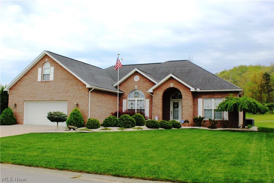 Beautiful Brick Ranch with lovely views of Woodridge Plantation Golf Course. This fantastic home offers an open floor plan with a split-bedroom design. Three spacious bedrooms, two full baths. Gorgeous kitchen with granite counter tops, stainless steel appliances and wine fridge and great lighting.  Living room boasts trey ceiling and double-sided fireplace. Great deck off the back of the home which backs up to the golf cart path.