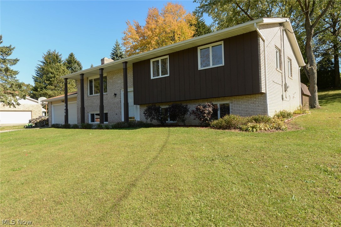 Have you been searching for tons of garage space? This incredibly maintained home, on a nearly half acre lot in Green has it all! At first glance you will see the original attached 2 car garage. Built onto that is another 2+ car (40ft x 38ft) garage with workshop area! Additional garage door to separate the original and new garage. First garage has it's own heater & wall a/c. Located near the edge of the Nimisila Reservoir, this large home offers 4 bedrooms, family room + a bonus room. The large living room opens up to the kitchen & dining room. Newer French doors off the dining room opening out to the back deck. The kitchen provides plenty of cabinets & counter space. Appliances stay, including the newer range. Carpet throughout the main floor is all new! There's a very large master bedroom with on-suite full bathroom, 2 additional bedrooms & full bathroom on the main floor. The 3rd bedroom is being used as a 1st fl laundry, but could easily be converted back. Downstairs i