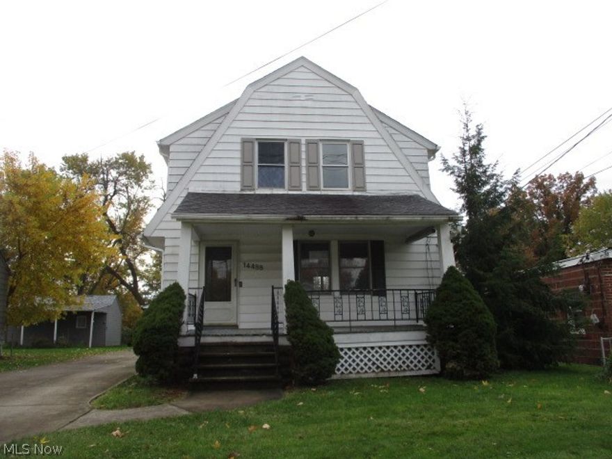 Dutch colonial offering deep park-like lot, 3 bedrooms, 1 bath Home, formal dining, large living with decorative fireplace, nice newer kitchen, hardwood floors, oversized garage.