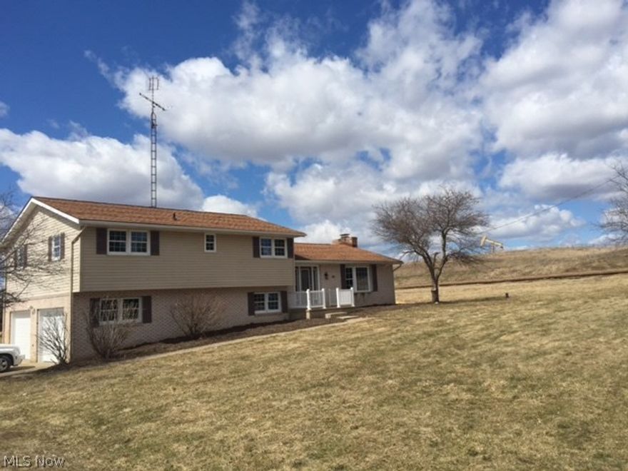 Perfect country property! Totally remodeled home on 7.94 acres with a 40x60 barn.  Nice open concept design with a stone fireplace and a bay window in the living room. There is a brand new kitchen with custom cabinetry. The Master suite is 14x20 with a large walk in closet, a makeup area and a large bath with double vanities  a corner tub and a separate shower. There is a total of 3 bedrooms and 3 full baths. There is an over sized 2 car garage that is finished and insulated with 2 new garage doors. Nice laundry area off of the garage. The family room is very impressive with a full wall brick fireplace with a mantle. Lots of room to spread out in this property with over 2400 square feet without including the basement. There is a large back deck off of the dining area. The barn has electric and water. There are also a couple stocked ponds. The mineral rights are already leased and do not transfer with this property. Immediate possession!
