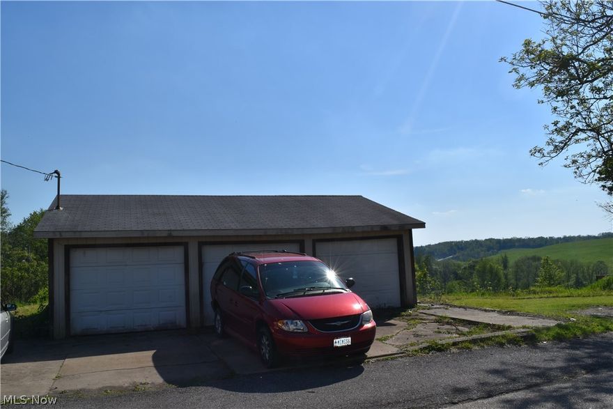 Just a garage. Looking for a 3 car garage to store your cars or just your stuff? This could be it.