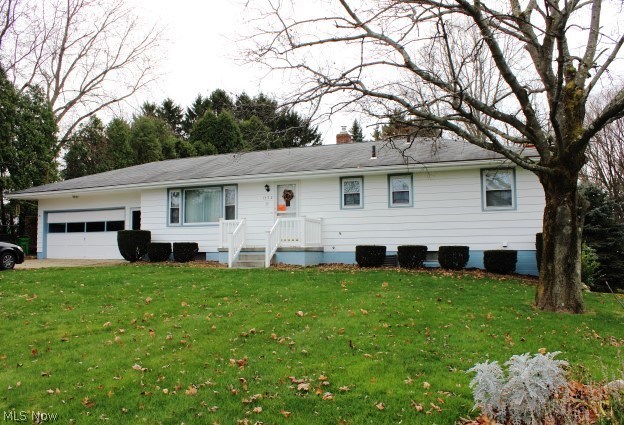 Beautifully cared for ranch with numerous updates situated on pretty 1/2 acre lot centrally located in Green* 3-4 bedrooms, 3 full bath, 1698SF including finished walk out lower level & 22x24 attached 2 car garage* Wood floors under carpet in living room, hall & master bedroom* Kitchen with roll out shelves, pantry, range, refrig & dishwasher* Dining area with desk* Master bedroom with ceiling fan & master bath with ceramic floor & laundry chute* Guest bath with granite vanity & laundry chute* Lower walk out level with recreation room with corner gas log fireplace with access to 10x21 3 season sun room* Lower level bedroom & full bath with ceramic floor* Washer & dryer included* Some replacement windows* Furnace & A/C approx. 7 years* Updated electrical box* Intercom* Pristine condition* Immediate possession* Home Warranty provided*