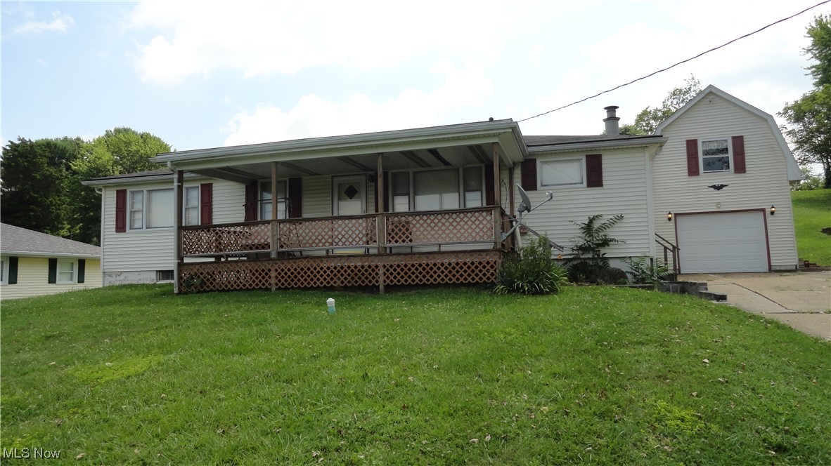 Well maintained ranch home with lovely country setting. Enjoy the sunset from the 9x24 covered front deck. 3 bedrooms, one of which now has laundry, full bath, huge living room, large dining room with spacious kitchen round out the main floor. Beautiful hardwood floors under the carpet. Basement has 3 main areas that can be finished, along with a shower/toilet space, and a fruit cellar. Garage is detached with a wood shop upstairs. Shed in back yard for more storage. Nice yard, plenty of space for kids to play while adults sit and visit. Comcast high speed internet available.