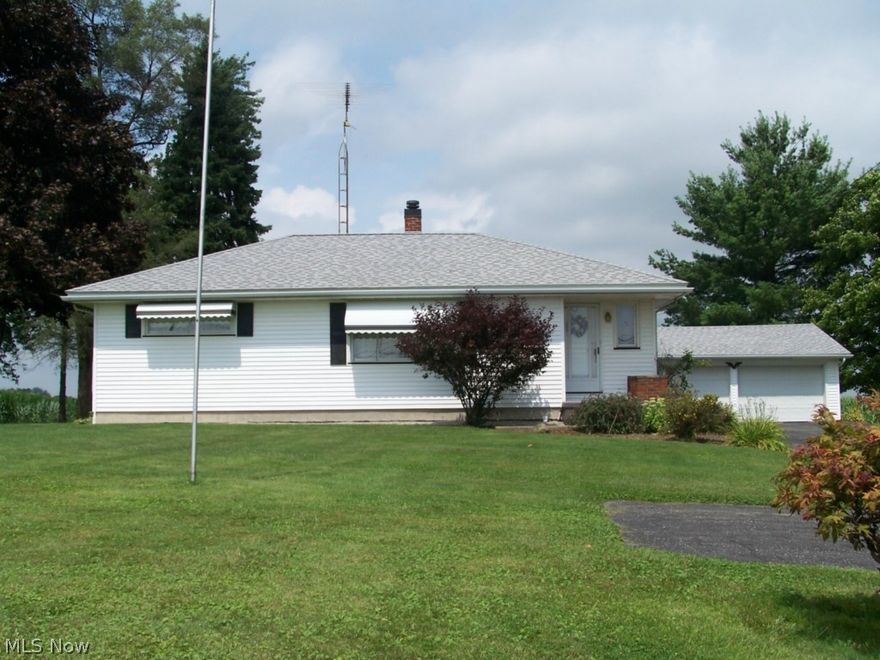 2 bedroom ranch on two lots totaling 1.58 acres.  Detached 2 car garage and additional storage shed.  Partially finished basement.