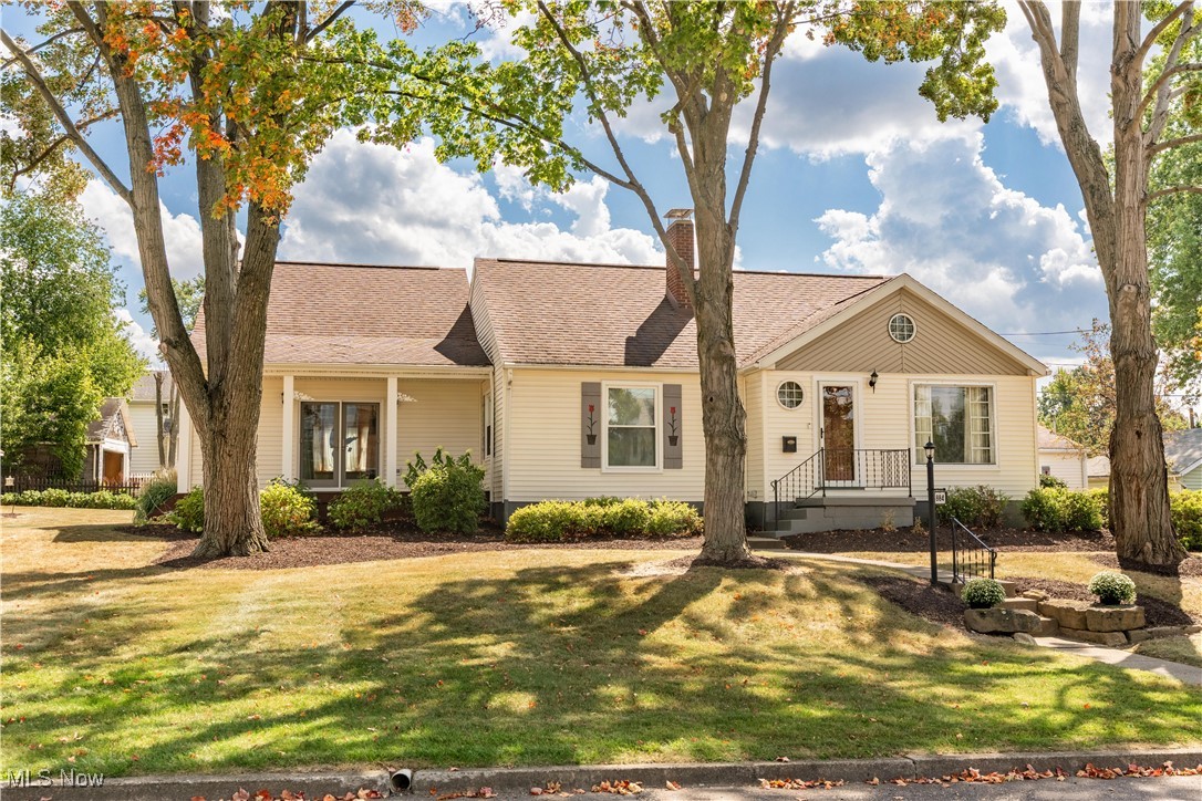 This immaculate bungalow is packed with updates and thoughtful details, truly a must-see! Meticulously maintained and filled with updates, this home offers move-in-ready convenience with modern charm throughout. The inviting great room sets the tone with oversized windows that flood the space with natural light, a cozy wood-burning fireplace, and gleaming hardwood floors. A formal dining room with arched entryways opens through double doors to a private side deck, perfect for entertaining. The updated eat-in kitchen features crisp white cabinetry, a tile backsplash, a built-in wine rack, a large pantry, and serene backyard views. Two spacious bedrooms and a full bath with a tub-shower combo and storage vanity sit just off the great room. At the end of the hallway, the family room impresses with a bay window, double glass doors to the front porch, and access to the back deck. Upstairs, discover a third bedroom with an oversized 10x8 closet and an attached bonus room. The finished basement expands your living options with a laundry room featuring a kitchenette, a modern full bath, a recreation room with a 7x7 storage closet, and two additional bedrooms, one boasting a 12x13 dream closet. Step outside to enjoy a well-maintained backyard oasis complete with a detached garage and a quaint storage shed, offering both relaxation and functionality. Recent Updates Include windows, doors in garage, kitchen remodel, attic bedroom, basement finished, house addition, roof on garage and house, both ac units, furnace in addition, basement bathroom, egress window, refinished hardwoods. Don’t miss the opportunity to call this beautiful bungalow your home. Schedule your private showing today!