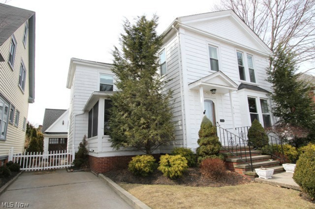Welcome to this stunning remodeled Century Home situated in the desirable Painesville Historic District overlooking the Grand River Valley. Beautiful hardwood floors flow throughout the large Formal Living Room. The charming floor plan has so much to offer including a spacious 21’ Family Room with a gas fireplace, a Formal Dining Room with amazing custom wood work, 8” baseboards and beautiful crown molding throughout. The remodeled Kitchen showcases newer countertops, refinished cabinetry and newer laminate flooring. Upstairs you will find 4 huge Bedrooms and a completely remodeled Full Bathroom. The newer heated 1.5 car Garage is finished and features a Kitchenette. Newer updates to the property include: Roof, vinyl windows (2000), carpet and fresh paint throughout along with so much more. Wow, AGELESS BEAUTY!