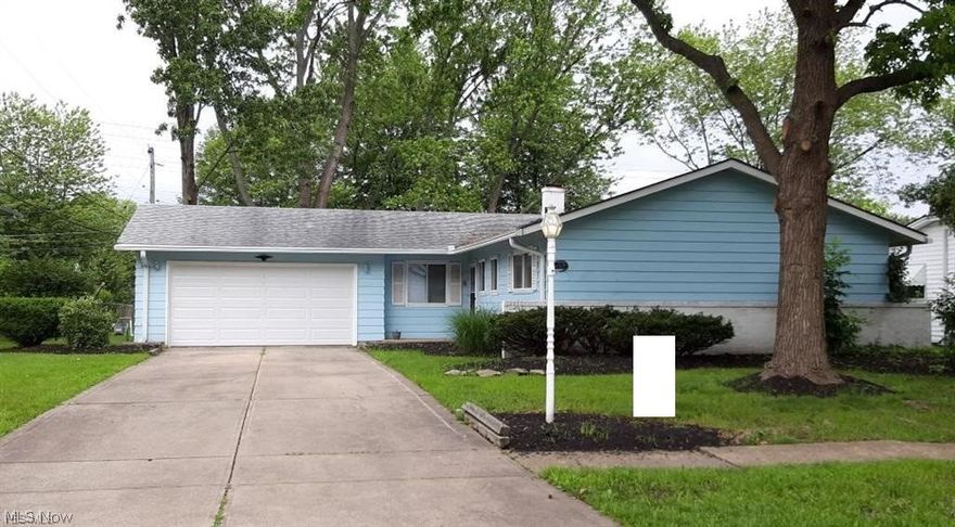 One floor living in this amazing remodeled ranch! 3 bedroom, 1.5 baths. Formal dining room, eat-in kitchen with updated custom countertops! Freshly painted in today's colors, newer lighting and flooring throughout. Oversized master bathroom renovated with new shower surround and newer vinyl tile flooring! Large laundry room with ample storage cabinets. Built-in storage closets in attached 2 car garage. Many options available in the family room/sunroom that walks out onto patio with fireplace too! Enjoy the private patio with built-in landscaping areas ~ many options available for converting this area to suit your needs. Large private treed back yard is perfect for those Summer gatherings! Come make it your own!