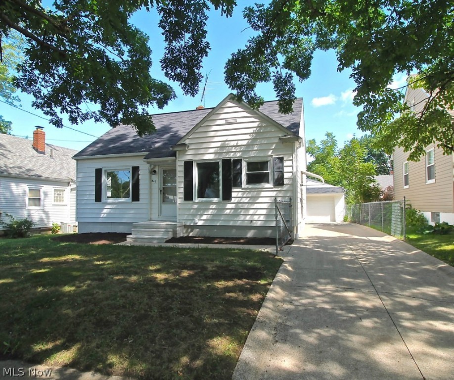 Very Clean, super cute two bedroom Cape with walk up attic space for additional bedroom or extra room. This lovely home has been freshly painted, and the original wood floors refinished to their natural beauty. Updated kitchen with gorgeous ceramic flooring going into the dining room. Family and dining rooms as well as the master bedroom and second bedroom have those beautiful wood floors. Very nice 1 1/2 car garage with extra storage! Fenced back yard with room for your pets or kiddos to play. Full basement with laundry room, glassblock windows, and utility sink, could be easily finished for added space, play area; office or entertainment area! This house is just waiting for you to move in to add your own special touches or it would be a great rental! Way too nice to pass up! This won't last long!