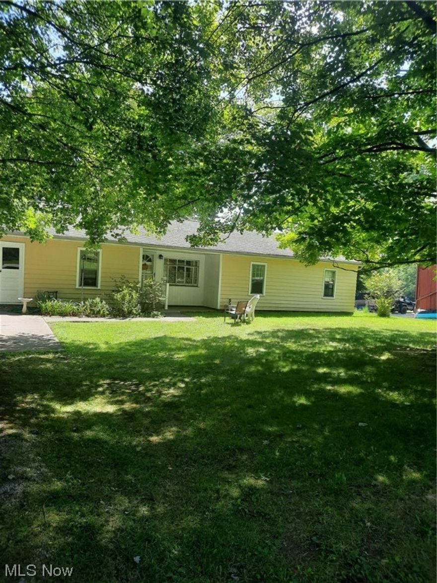 Three acres of country living for your enjoyment. Sought after Highland Local School District. Plenty of room for a family garden or set up your own vegetable stand. Maybe have a few animals. Beautiful back yard view. Two large trees shade the house both in front and back. Enter in the front door to a good sized living room with adjacent bonus room that could be used as an office or hobby room. Step into a cozy kitchen that sports newer cabinets. Master bedroom is off of the living room. Two more bedrooms are next to the bonus room, all of which have wood floors. Full basement with walkout door and washer, dryer, and freezer that stays with the property. This is an older house that is ready to move in or decorate the way you want to. The family is ready to sell after many years of good living there. Minutes away from grocery stores, restaurants, and box stores.  Selling as is. Seller to make no repairs.