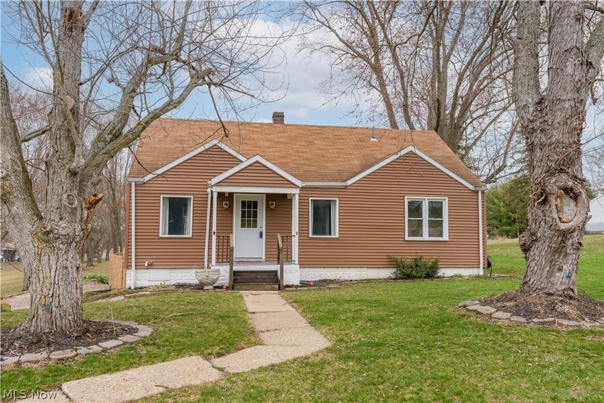 Enjoy space, comfort and outdoor living on nearly 2 acres in this well-maintained Canton South home featuring a heated pool, hot tub, first-floor bedroom and flexible living spaces! Located less than a mile from the high school and close to local shopping, dining and everyday amenities. The main level features new or newer LVP flooring and a spacious full bathroom with a walk-in shower and relaxing soaking tub. A desirable first-floor bedroom includes its own private half bath, while a separate office/study or flex room offers great space for working from home, hobbies or additional living needs. The welcoming living room flows into a large eat-in kitchen and gathering area featuring quality KitchenAid appliances and plenty of room for entertaining. French patio doors from the kitchen area lead to the large deck overlooking the backyard retreat—perfect for enjoying warm days by the gas-heated pool, relaxing in the hot tub or hosting friends and family. Upstairs you'll find two generously sized bedrooms with built-ins and an additional half bath. The lower level offers a laundry area, abundant storage and convenient access to the garage. The expansive backyard provides endless possibilities for outdoor activities, fires, gardening or recreation and includes a storage shed with electricity. Important updates include: Newer furnace and AC (2020), hot water tank (2018) and 200-amp electrical service (2016). The pool features gas heat and a new liner installed in 2025. The large hot tub is clean, ph balanced and ready for use. Don't miss this opportunity, set up a showing today!