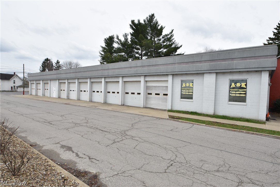 Great business opportunity in the heart of Columbiana. 10 door garage with many potential uses.
