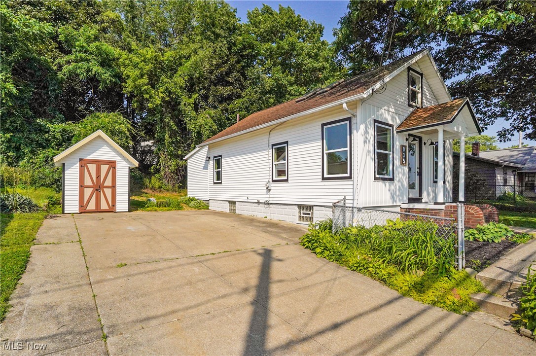 Lake Life, Simplified — Charming Bungalow on Portage Lakes! Welcome to your lake view escape! This picture-perfect, BEAUTIFULLY REMODELED bungalow sits directly across from the coveted shores of Portage Lakes, offering year-round views, peaceful vibes, and endless potential. With direct lake access, you’re just steps away from boating, fishing, kayaking—or just sipping your morning coffee while the sun dances on the water. Step inside to find a warm, cozy, and inviting space with an open layout and natural light. The kitchen and living area flow together seamlessly, making it easy to entertain or simply unwind while gazing through windows that frame the lake like art. A flexible bonus room adds extra versatility—use it as a third bedroom, office, or relaxing chill zone. Seller is offering up to $8,500 in buyer incentives! That includes a $4,000 credit to build your own garage and $4,500 credit for central air installation—so you can customize comfort your way. Want to move right in or create an instant short-term rental? The seller is also willing to sell the home fully furnished to the right buyer. Whether you're seeking a weekend getaway, a full-time lake lifestyle, or a potential Airbnb investment, this bungalow checks every box. Updates Include: New Windows (1st floor) (2024), New Flooring (2025), Renovated Bathroom (2024), Kitchen Countertop, Sink, Backsplash (2025), Lighting (2025), and more! Outside, enjoy a spacious yard perfect for entertaining, a fire pit for summer nights, and a deck that begs for sunsets and stories. Located just minutes from restaurants, marinas, and the laid-back charm that makes Portage Lakes a true Northeast Ohio gem. Your lake life starts now—don’t let this one float away.