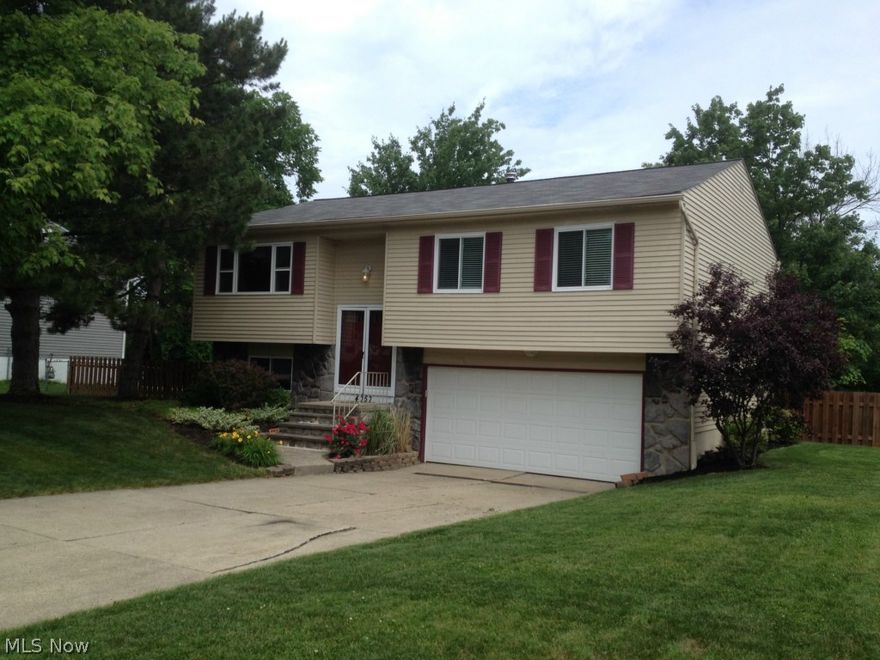 Spacious Bi-level, on large 102x150 fenced yard. Perfect for family, pets or pool. Open floor plan with living room, dining room, and kitchen perfect for entertaining. Beautiful wood work throughout and solid wood doors. Improvements include updated flooring/carpet on main floor and baths. Large lower level family room 25x12 with half bath which open to newer 19x17 patio and 16x15 deck. Great kitchen with good cabinet space, ceramic floor, island/breakfast bar, and all appliances remain. New furnace & HWT installed in 2014. Convenient location! A Must See!