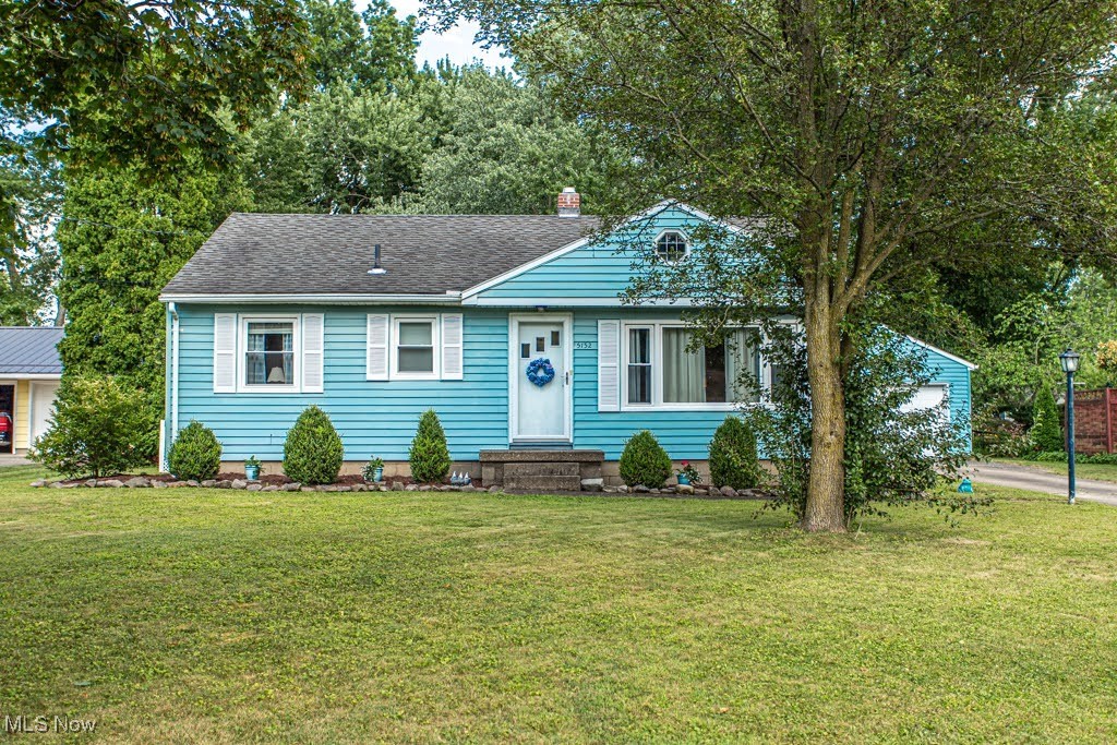Come check out this charming 3 bedroom ranch home in Champion with fenced in back yard and 2 car garage! As you enter the front door there is a living room or dining room with hardwood floors that also are in all 3 bedrooms. Updated bathroom. Living room flowst to eat in kitchen area that leads to spacious family room that you can walk out to deck where there is a fenced in back yard. Downstairs you have a recreation room, laundry area and workshop. Updated windows amd electric panel! Dont miss seeing this home! Call for your private showing today!