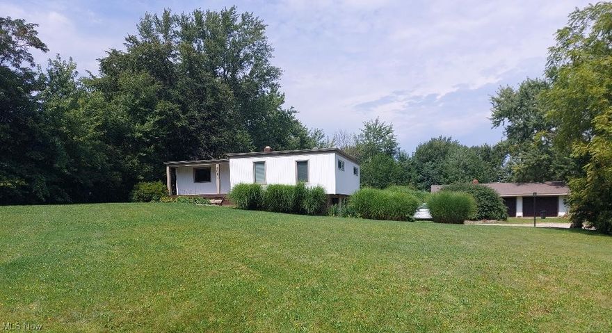 Contemporary, modern 3 bedroom, 2 bath home that is an entertainer's dream. The gorgeous kitchen features Kraftmaid cabinets with quartz countertops which overlooks the spacious living room with a vaulted ceiling and 2 dining areas. The living room has 2 sliding glass doors that open up to the lagoon pool surrounded by pavers. There is also a 1600 sq. ft. garage in the back of the property, perfect for storing cars or equipment. Please call to schedule your appointment today.