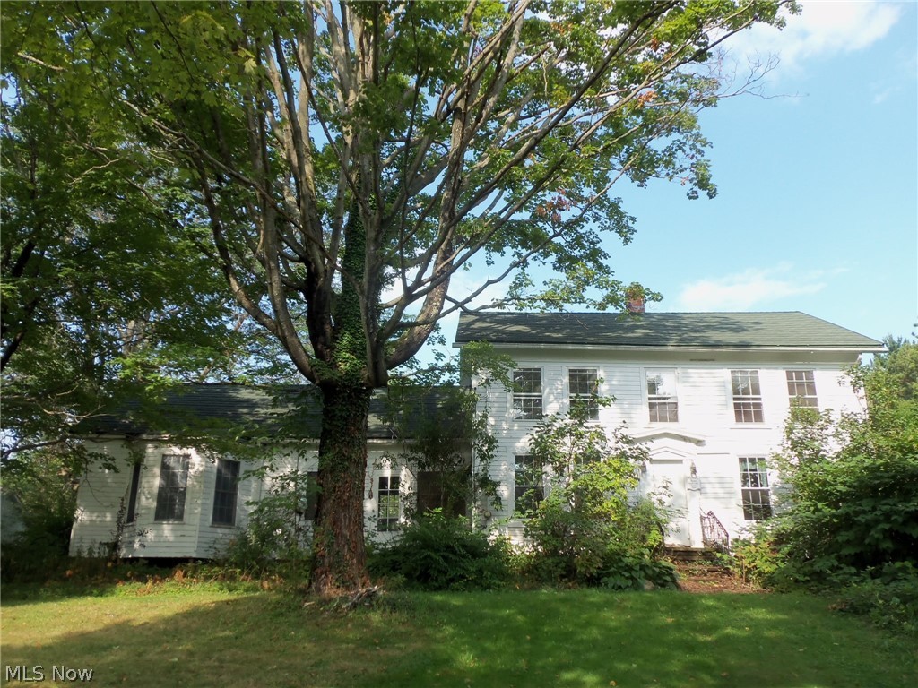 This Historic Century plus home has great bones, just needs some new energy. Some hardwood flooring and Beautiful old hardware and woodwork. Bonus room is large walk-in attic located off the Second floor bathroom. Property is mostly wooded and has a 24x40 pole barn with dirt floor, perfect for livestock. New septic installed in 2007.