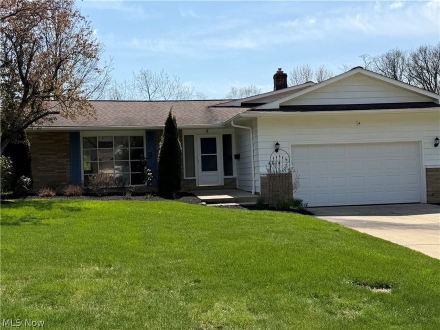 Great location in South Euclid among like larger homes. Very close (walking distance) to Memorial Junior High and Brush High School! Step inside to a warm and inviting foyer that opens into a spacious living room, filled with natural light from a large picture window, creating a cohesive and welcoming feel. The open-concept kitchen and Beamed Cathedral ceiling Family Room are ideal for family gatherings and entertaining—Finished recreation room with wet bar offers another separate gathering spot. Beautiful setting in family orientated neighborhood.