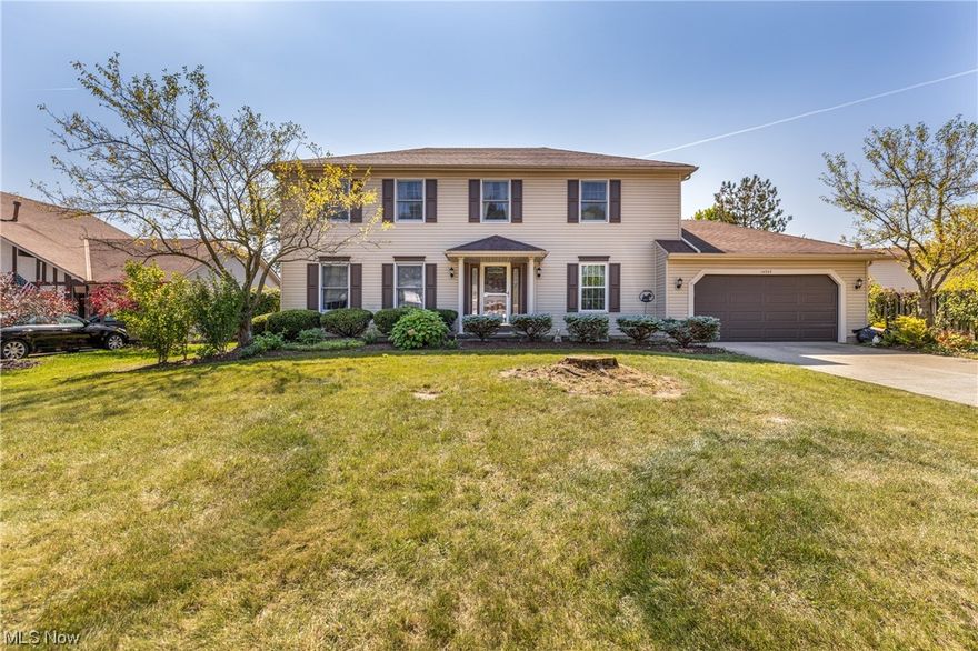 Welcome home!  You will fall in love with this 4 bed 2.5 bath colonial! The outside feature updated vinyl siding and a newer roof. As you walk in you are greeted by beautiful tile floor that flows though the eat in kitchen!  The dining room features beautiful hardwood floors!  You will love the way the eat in kitchen opens up to the large family room. The family room features a beautiful wood burning fireplace! The first floor also has a large living room or home office.  Walk upstairs and you will three nice sized bedrooms and a beautiful second full bathroom!  You will love the large master bedroom that feature a large walk in closet and a master bathroom with vaulted ceilings!  Walk downstairs and you will find a full unfinished basement ready for your finishing touch!  This home is in a great location walking distance from the community pool, playground, park, and tennis/basket ball hoops! The seller is also offering a one year home warranty for you r peace of mind! This home will not last long.  Schedule your appointment today!