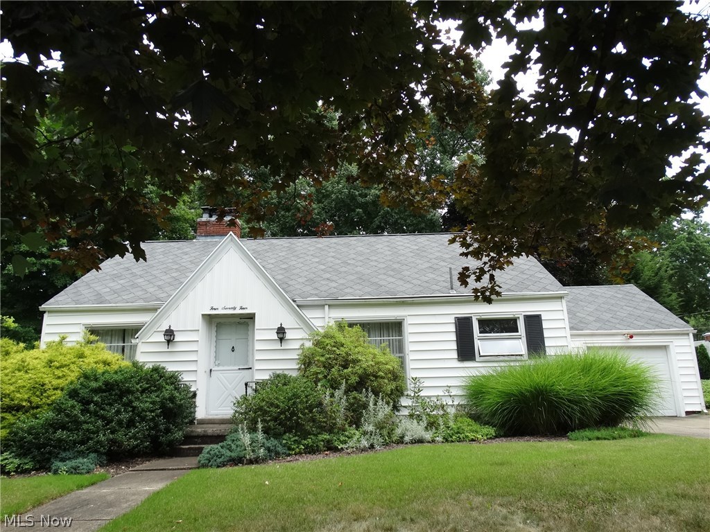 If charming is first on your list than you will want to view this Story and a half that is nestled in the trees. This two bedroom two full bath home offers the possibility of your finishing the second floor and adding a third bedroom. The living room offers a charming fireplace and built in drawers and shelving. The formal dining room offers a charming corner cabinet. Two spacious bedrooms with ample closet spaces. The screened in porch will offer you hours of relaxation. A wonderful area to enjoy your morning coffee or spend a summer afternoon. The fenced tree lined yard offers privacy and a great family play area. Basement offers a walk out to the rear. Rec room area with fireplace. lower level offers full bath, ample storage areas and laundry . Call today to view. You'll be glad you did.