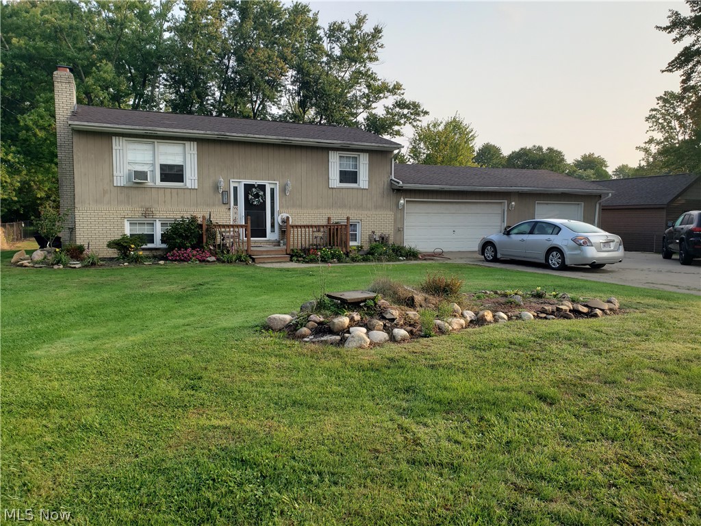 Welcome home to this super spacious 3 bedroom, 2 bathroom home! Enjoy an awesome outdoor space perfect for entertaining! Two-tiered, partially covered deck, hot tub, pool (complete with concrete pad underneath if you just prefer a patio), huge 30x20 vaulted great room / recreation room with fireplace and office! 3 car heated garage! Plenty of yard and storage! Newer 40 yr shingle roof, 200 amp electric service, 2 - 150 gallon H20 heaters, newer flooring and fresh paint too! Plenty of parking! Perfect for a home business! Fantastic community! Great location! Wonderful .6933 acre yard is perfect for pets, children and your garden! Schedule your showing today. This is a must see!