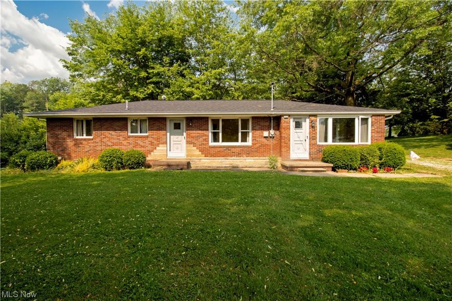 Rare find in Dalton, great location within Village limits!  Brick ranch on two acres with Village of Dalton utilities.  From the front door, the living room leads into the eat-in-kitchen.  Three bedrooms located down the hall as well as a full bath.  Another living/family room located on the other side of the kitchen with an additional half bath.  Back yard is quiet and secluded, there is a 24x24 detached garage and a storage shed.