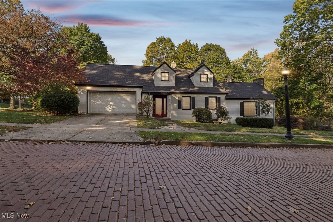 Welcome to your dream home in Akron. This charming property features three bedrooms and one and a half baths, situated in a highly popular area. It is close to Portage Country Club and just a short distance from Canyon Trail Park. This home has undergone recent upgrades, including a new roof, siding, gutters, and mechanical systems, ensuring everything is in excellent condition for the long term. Inside, a fresh coat of paint enhances the open and airy atmosphere. The kitchen is a highlight, boasting a tile backsplash, stainless steel appliances, and upgraded cabinetry, offering ample space for culinary endeavors. The first floor provides ample living space, with separated areas for living, dining, and family gatherings. Upstairs, you will find cozy bedrooms with plenty of closet and storage space. New carpeting throughout adds comfort. The full basement offers versatility for a personal retreat, workout area, or play space. The backyard serves as a private haven, surrounded by lush trees and mature landscaping, ideal for relaxation. Don’t miss the opportunity to make this lovely Akron home your own.