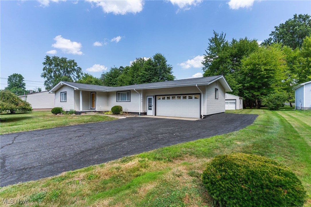 Have you been looking for that home that is super sound, good bones, well taken care of, and just needing a few minor updates? Wanting to create your own equity? This home is just the home you have been waiting for. Located towards the end of a dead end street, this 3 bedroom, 2.5 bath ranch is a sure prize. With a large 2 car attached garage and another 1+ car detached garage, those looking for extra garage/workshop space will be thrilled! Likewise, the extra wide and long parking that once served to park an RV will be an added bonus. Don't forget the step down sunroom with the wood burning stove when you are thinking of all the reasons to love this place! The basement is partially finished, with a full bathroom, should you want to expand living area! While some of the features are original, you will see that the owner took much pride in her home. The cabinets are in pristine shape as they were treated weekly with care. Most of the house is carpeted, however I have been told that there is hardwood under much of the carpets! Priced so well for the area! Sqft of 1469 includes the 1,309 from the main house, plus the 160 of the sunroom addition. Call your favorite realtor and get here soon.
