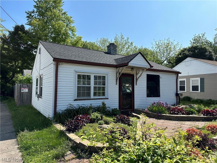 HANDYMAN/INVESTOR SPECIAL! Welcome to 11408 Kensington Avenue! This cozy ranch in Kensington Gardens is ready for its final touches. Many of the main components in the home have already been updated. This home boasts two bedrooms, a walk in closet connecting the two bedrooms, an updated bathroom and kitchen. Currently, the second bedroom is set up as a laundry area, but could easily be used as a bedroom again. On the exterior, the home has a good sized lot with a three car detached garage, fenced in backyard, and deck overlooking Countrymans Creek. This is a view that is hard to come by in Cleveland. Come check this home out while it’s still available! Home is being sold “As Is”.