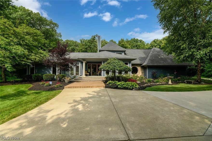 Welcome Home to 5060 Black Road in Richfield. This remarkable property has been meticulously cared for by one owner.  Modern, open floor plan with impressive craftsmanship and design.  The views from every window are spectacular! The outdoor living space is exceptional from the covered back porch to the waterfall and pond. From the moment you walk in the front door you will see the luxurious amenities this home has to offer. The dramatic Family Room includes a vaulted beam ceiling and a custom copper fireplace. The recently updated eat-in Kitchen is a natural showplace for entertaining. First floor Master Bedroom, 2 additional Bedrooms on 2nd floor offer privacy for family or guests, plus first floor Home Office.  Formal Dining Room is flooded with natural light!  Located in Revere School District. This home is so warm and inviting!  Be prepared for an experience when you tour this exceptional home. Located on 3.4 acres and includes an additional parcel with over 5 acres. Call today fo