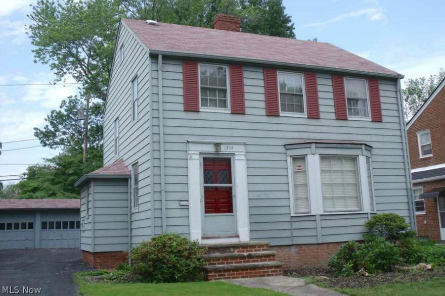 Well built South Euclid colonial with roomy first floor addition is ready for a new owner! Traditional elements include wood burning fireplace, hardwood flooring, entry vestibule and living room bay window. Updates include 50 gal. water tank 2010, new roof 1999, 8 glass block windows, steel entry door 2015. Newer carpeting in living room, dining room and family room. All major appliances and window treatments included. Summer is here - enjoy the whole house central air and built-in natural gas grill! Half bath conveniently located near back entry. Front half of basement designed to be finished has seven foot ceiling and a basic fireplace.  All utility connections are placed in back half of basement. Close to University Circle, Cleveland Clinic and Little Italy. Very affordable living in a nice neighborhood. Call today to schedule your private showing!