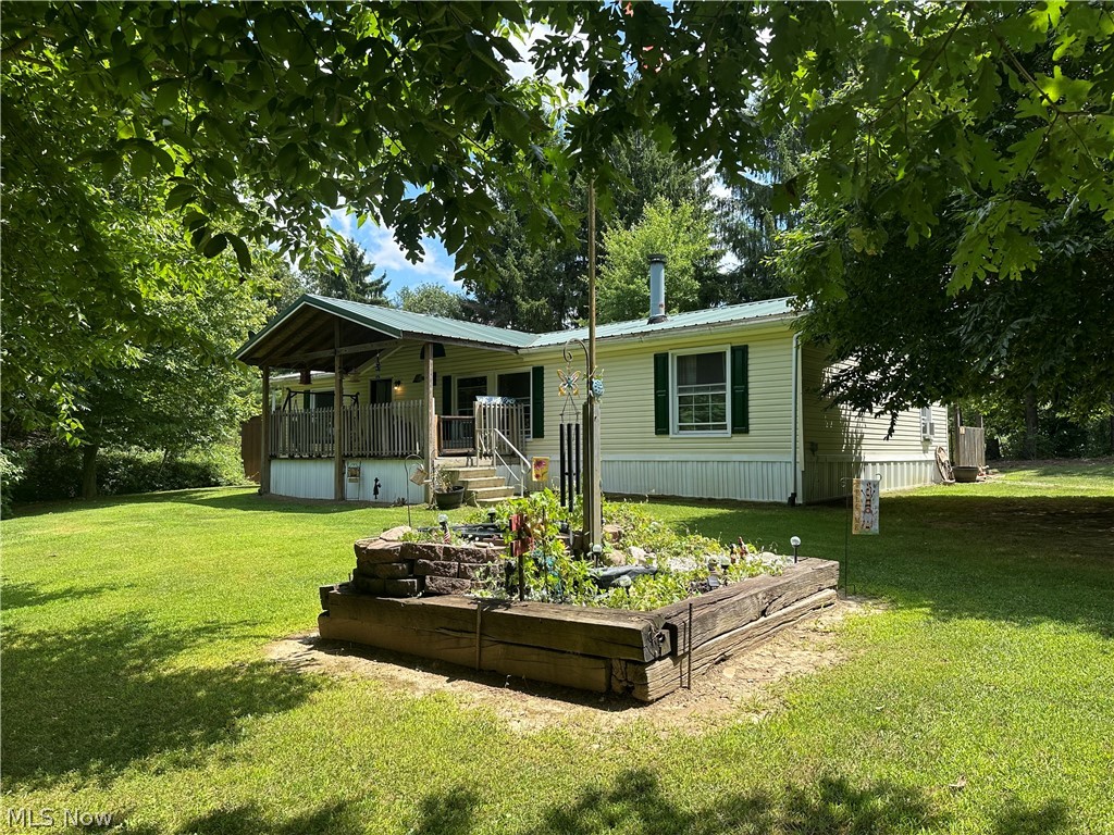 OUTDOORSMAN PARADISE! You do not want to miss out on this opportunity! The original home consisted of 3 BR/2 BA. It is currently a 2 BR/2 BA home, but can be easily converted back to 3 bedrooms. Kitchen updated in 2017 with all new cabinets, back splash, counter tops, and appliances. Brand new carpet in hallway and 2nd bedroom. Metal roof on house in 2013. Home also boasts covered front porch and cover back deck measuring 14x56. Enjoy your own private bar area with additional seating to extend your everyday living outdoors! Electrical hook-up for hot tub on far end of back deck. 3 car detached garage includes concrete floors, full electric throughout, an oil furnace and pellet stove for heat, a compressor/tool room, and its own 100 amp service. Additional 12x20 outbuilding shed with electric and is partially insulated with double barn doors. Equipment Barn measures 16x40. Additional single car garage 12x30. NOW, lets talk about the 29.738 acres of pure serenity out your back door. FIVE hunt stands currently located throughout the property and all will stay!! Many pretty water holes with nature made water fountains. Open fields and mowed paths for you to walk the whole property. Wear your boots and prepare for 2 hours of pure natures enjoyment! you will not be disappointed! Please do not pull down into driveway or try to walk the property without your realtor. Call me today to schedule an appointment for your own private tour!